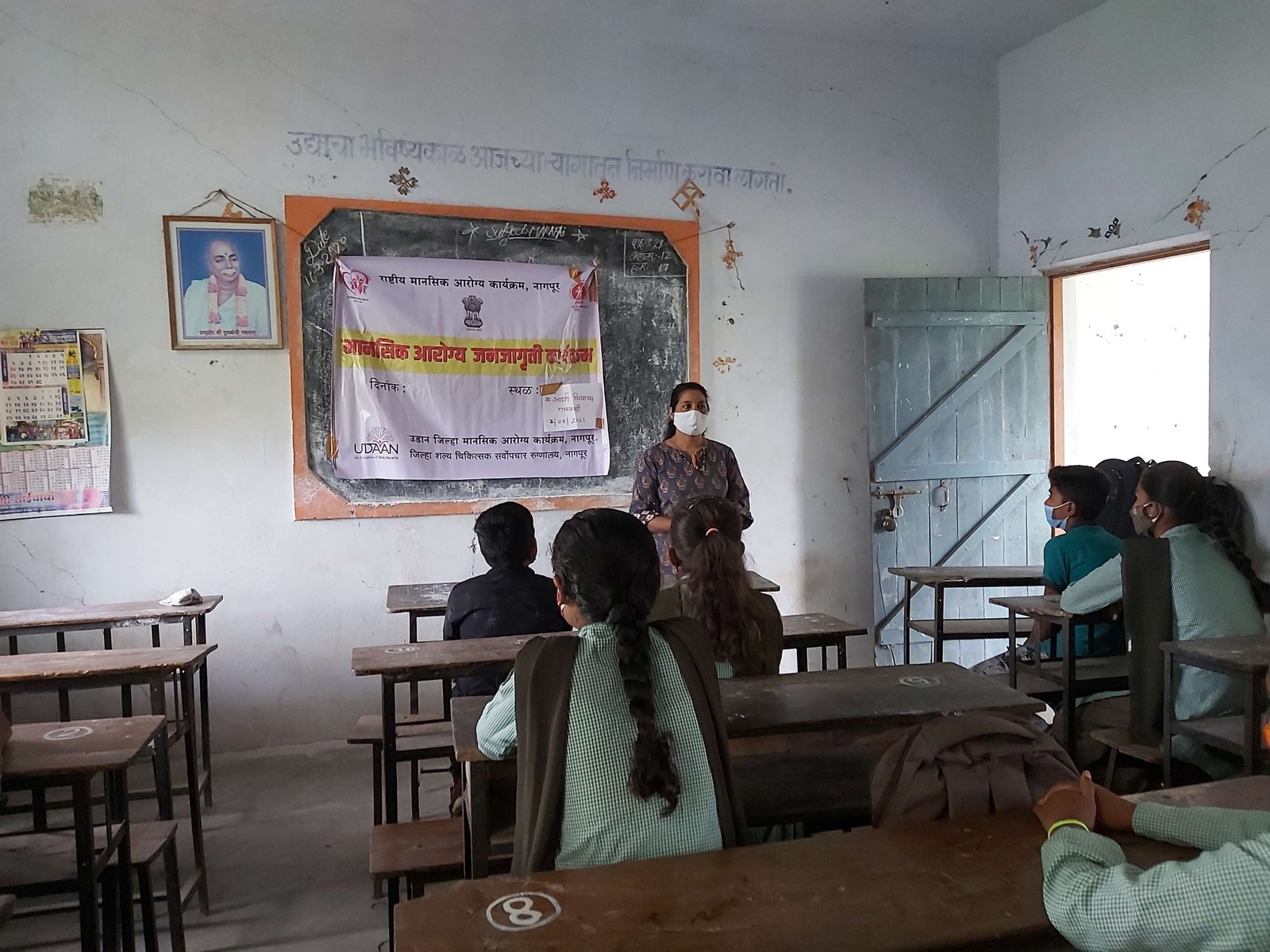 UDAAN community awareness workshops women sitting in a row mental health stigma reduction
