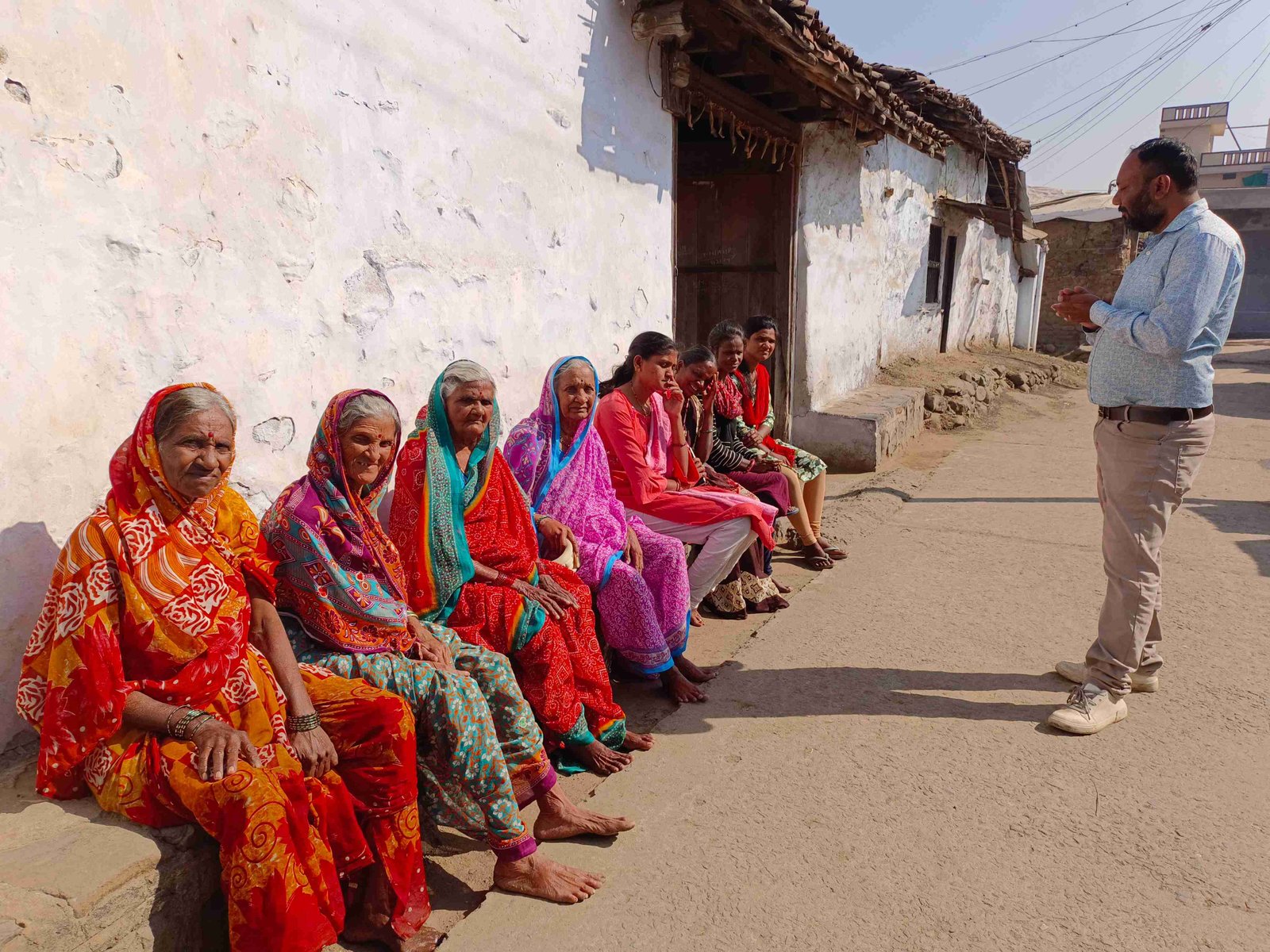 UDAAN psychosocial support man helping woman counseling emotional care mental health