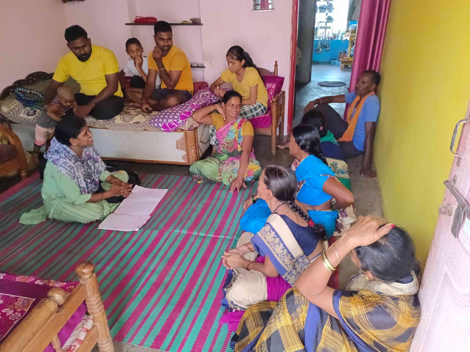 UDAAN caregiver support programs two women sitting side by side family mental health education